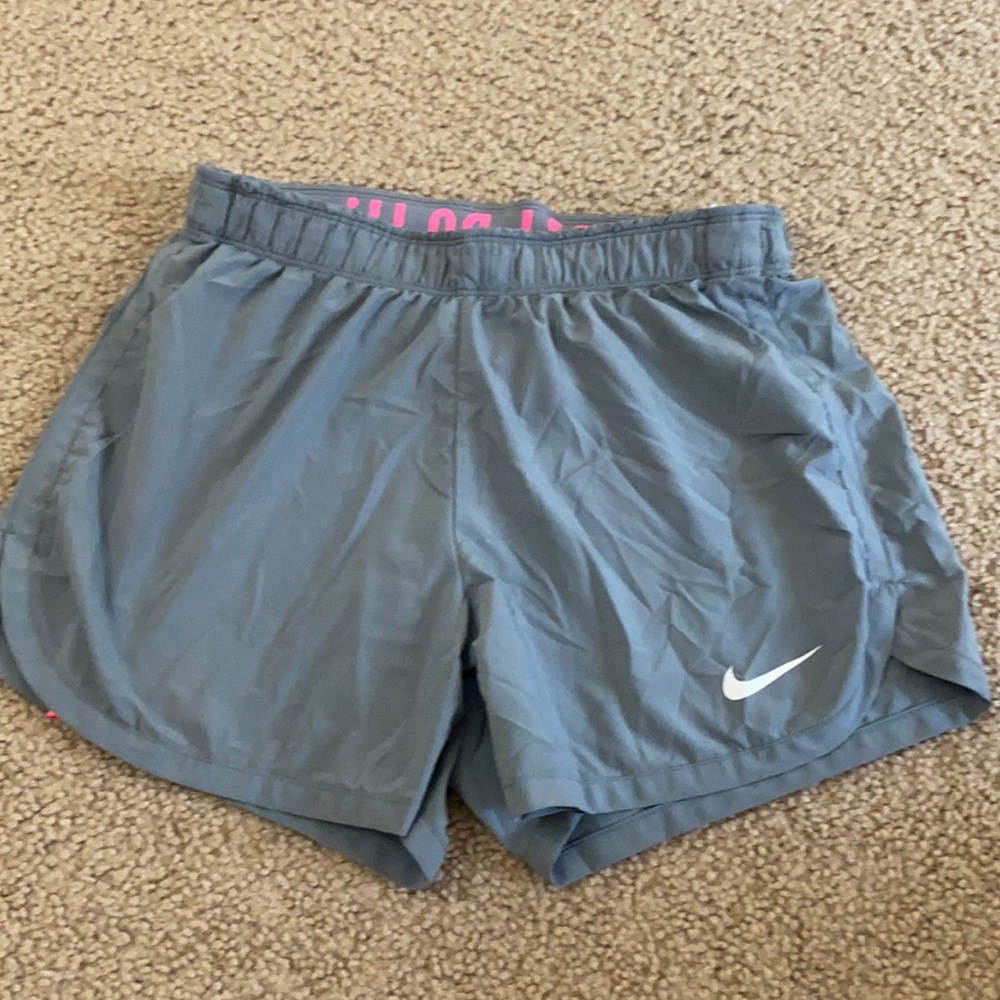 Women’s grey Nike running shorts- size small
